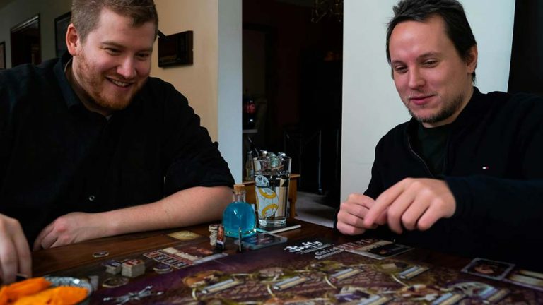 Board-Game-Channel-Name-men-playing-a-board-game-smiling