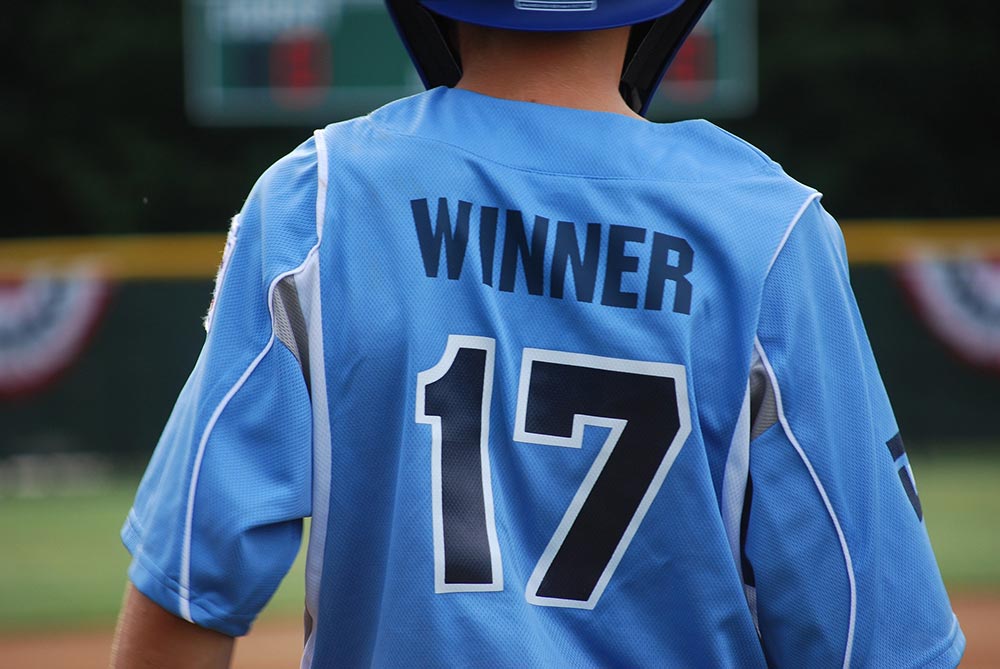 Sports-Betting---back-of-football-plyer-jersey-that-says-winner.